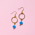 Golden Hoop with Blue Swirl