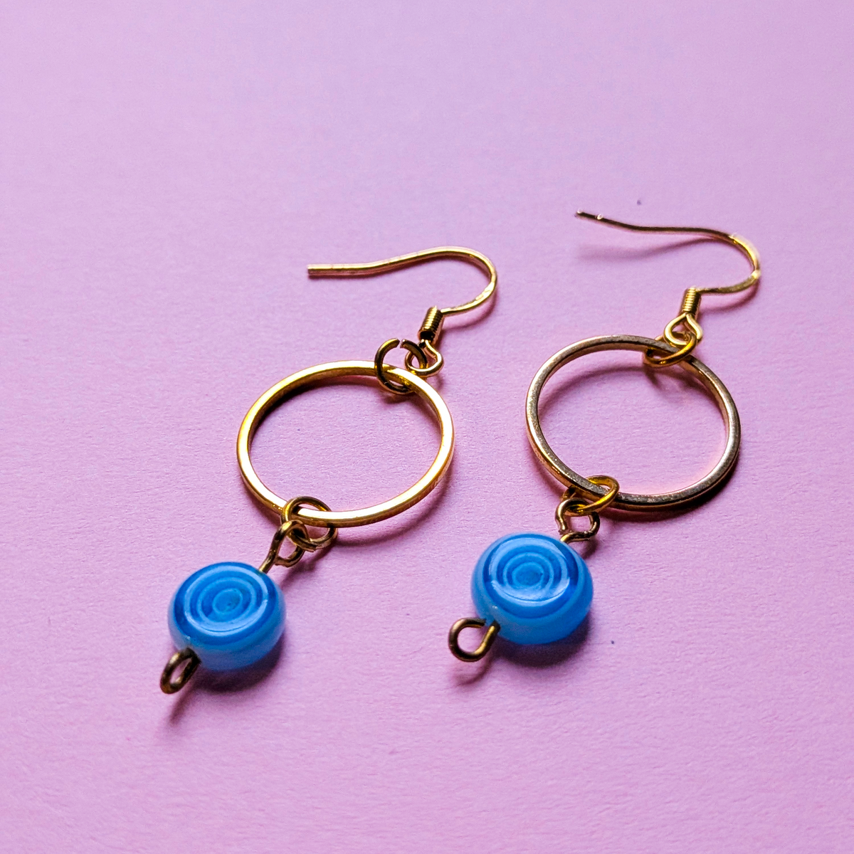 Golden Hoop with Blue Swirl