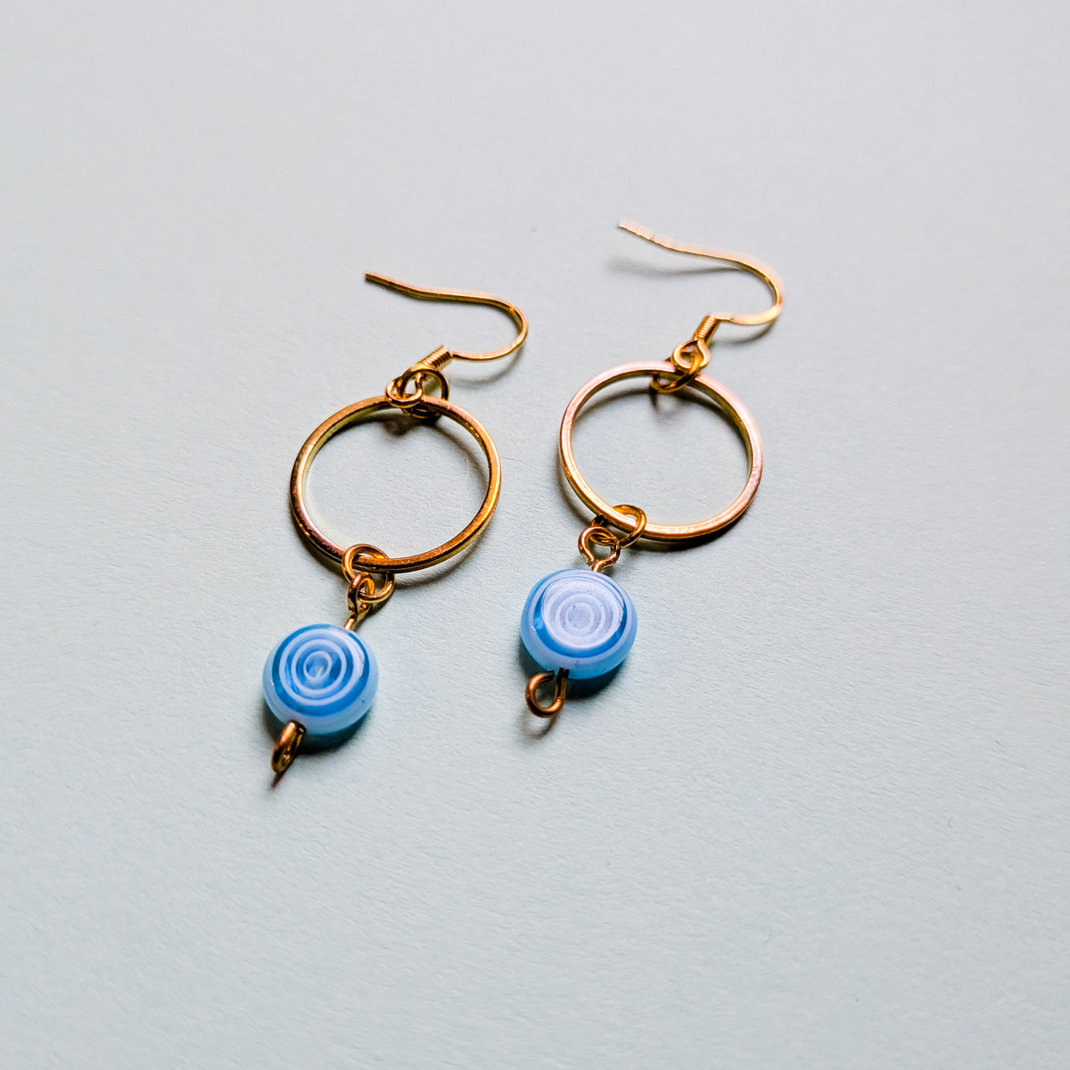 Golden Hoop with Blue Swirl