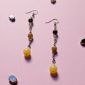 UniquelyYou handcrafted beaded drop earrings featuring yellow and forest green stones on silver-tone chains.