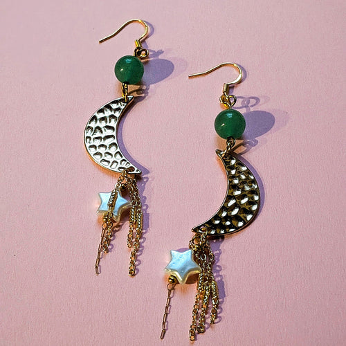 UniquelyYou gold-tone celestial drop earrings with textured crescent moons, green beads, star charms, and tassels.
