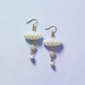 UniquelyYou white cloud and star dangle earrings with gold-tone hooks and chains, featuring pearl-like charms and white beads.