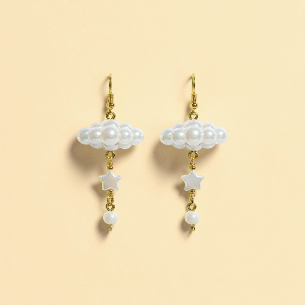 UniquelyYou cloud and star dangle earrings with pearl clouds, star charms, and white beads on gold-tone hooks.
