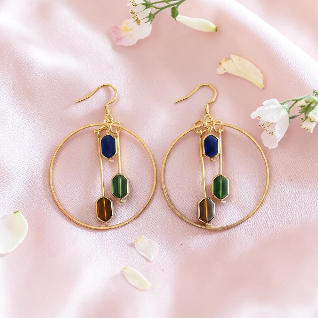 UniquelyYou gold-tone hoop earrings with dangle design featuring faceted blue, green, and amber geometric beads.