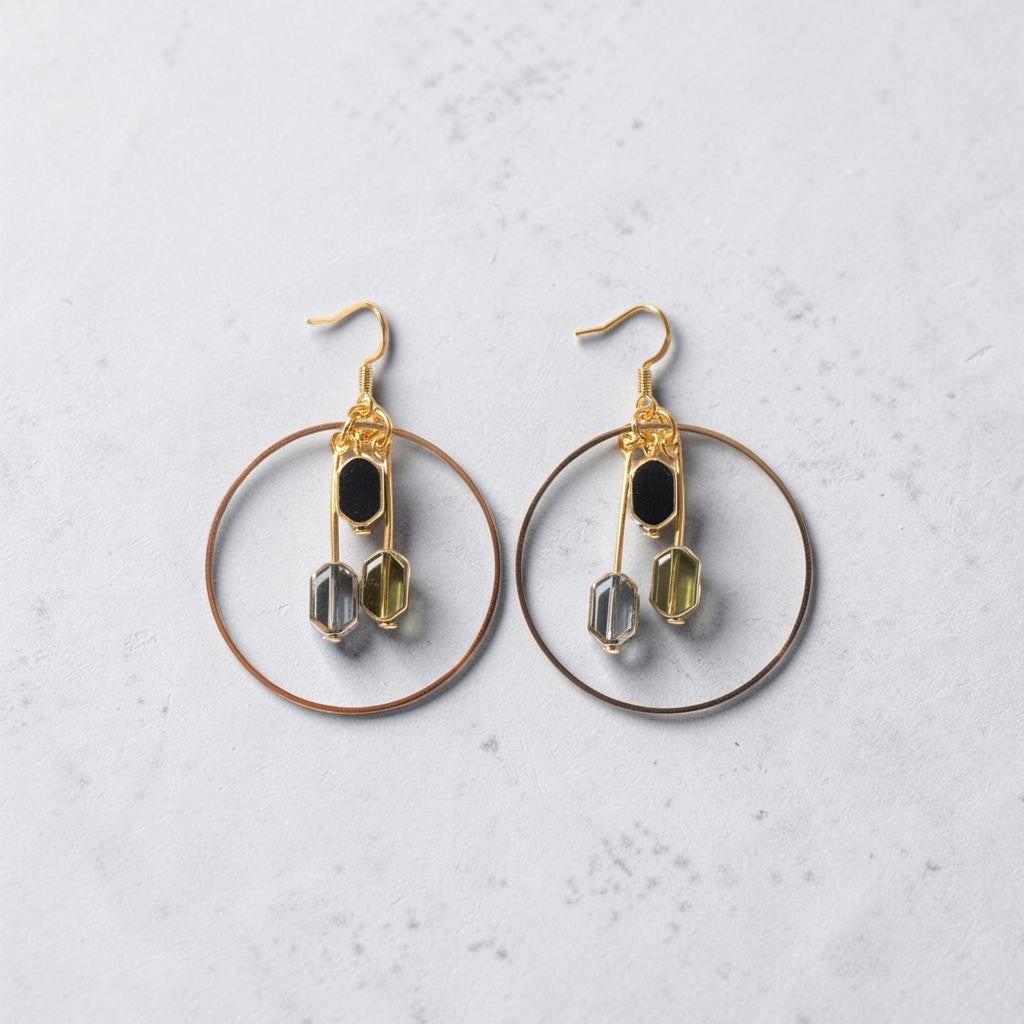 UniquelyYou gold-tone hoop earrings with dangle charms featuring black geometric beads and faceted blue and green beads.