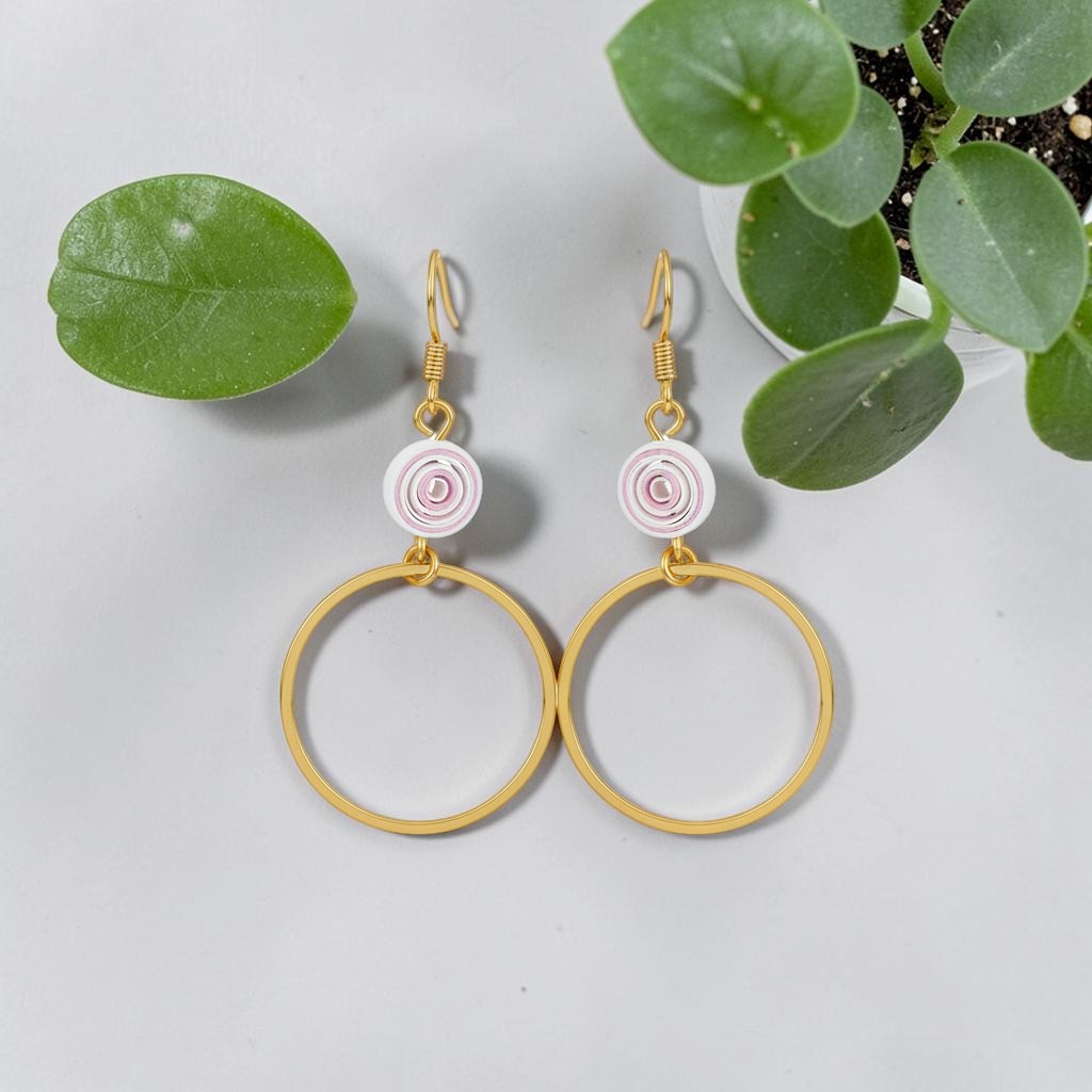 UniquelyYou gold hoop earrings with white and pink spiral beads. Delicate, lightweight, and elegant.